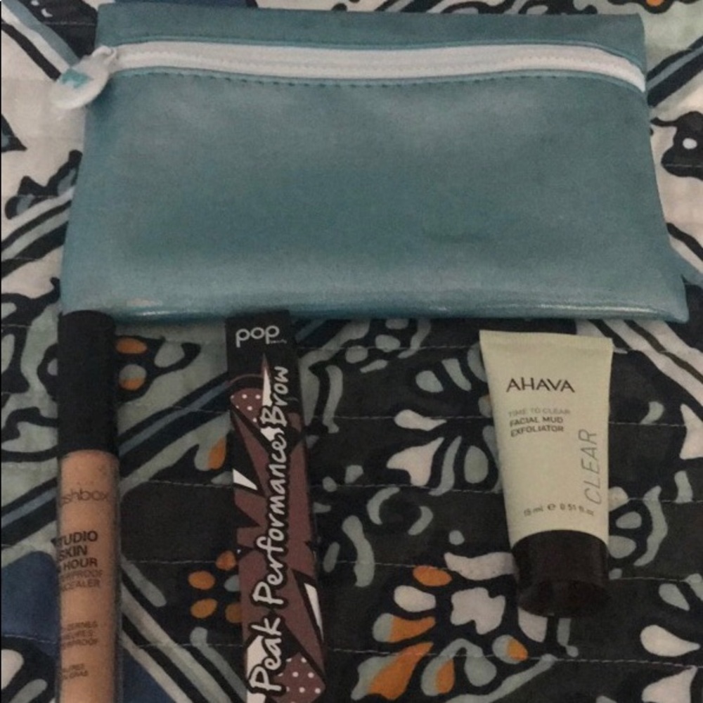 Ipsy bag with 3 cosmetic items comes all together